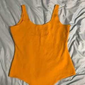 Large yellow bodysuit
